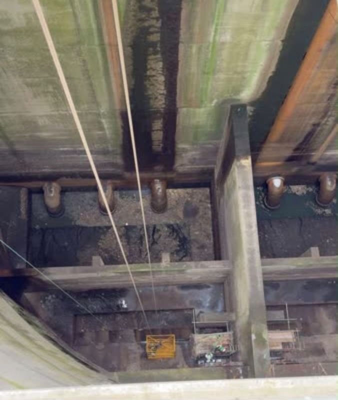 Rigging works during removal of a 6m high 4.5 tonne penstock beneath Belfast