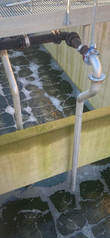 Process pipework installed over a water treatment tank by Liberty Water