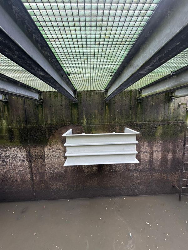 GRP baffle designed, manufactured and installed as part of the flow measuring weir system
