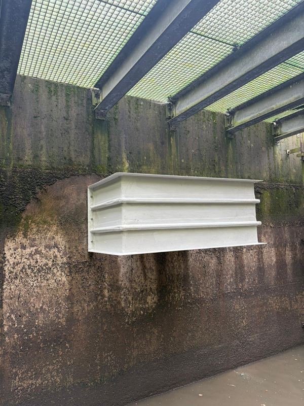 Side detail of the installed GRP baffle within the flow measurement chamber